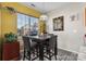 Bright dining area with a modern light fixture and a window at 1821 Ethel Guest Ln, Charlotte, NC 28206