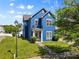 Charming two-story home with a well-maintained lawn and beautiful curb appeal in a desirable neighborhood at 1821 Ethel Guest Ln, Charlotte, NC 28206