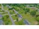 This aerial view shows the property nestled within a friendly neighborhood with tree-lined streets and well-manicured lawns at 195 Antler Dr, Statesville, NC 28625
