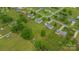 An aerial view of the property, showcases a well-maintained lawn, privacy fencing and convenient proximity to amenities at 195 Antler Dr, Statesville, NC 28625