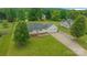 Inviting single-story home showcases a sprawling yard and convenient two-car garage at 195 Antler Dr, Statesville, NC 28625