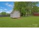 Storage outbuilding in a spacious backyard perfect for all your yard and tool needs at 195 Antler Dr, Statesville, NC 28625