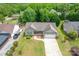 Desirable neighborhood featuring a home with a manicured lawn and a spacious driveway at 206 Pine Meadow St, Hickory, NC 28601