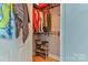 Walk-in closet with shelving, hanging racks, and shoe storage at 206 Pine Meadow St, Hickory, NC 28601