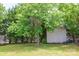 Discover this backyard shed offering additional storage and functionality, nestled amidst the greenery of the backyard at 206 Pine Meadow St, Hickory, NC 28601