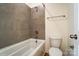 Modern bathtub and shower area with tiled walls and efficient fixtures in a well-lit bathroom at 206 Streamwood Rd # 32, Troutman, NC 28166