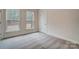 Bright bedroom with plush carpeting, neutral walls, and large windows offering natural light at 206 Streamwood Rd # 32, Troutman, NC 28166
