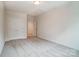Neutrally painted bedroom with carpet, closet, and an ensuite, offering a private retreat at 206 Streamwood Rd # 32, Troutman, NC 28166