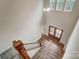 Grand foyer with hardwood floors, a staircase with white risers, and a view of the entrance at 206 Streamwood Rd # 32, Troutman, NC 28166