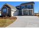 Beautiful two-story home featuring a stone and siding exterior with a large driveway and attached garage at 2068 Fordhill St, Rock Hill, SC 29732