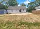 Spacious backyard featuring a concrete patio and a storage shed, perfect for entertaining and outdoor activities at 211 Sherwood Cir, Rock Hill, SC 29730