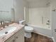 Cozy bathroom with granite vanity and new fixtures, featuring a shower over tub at 211 Sherwood Cir, Rock Hill, SC 29730