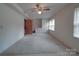 Spacious bedroom with ample natural light and a ceiling fan for added comfort at 2213 Milton Rd, Charlotte, NC 28215