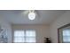 Bright bedroom featuring a ceiling fan, natural light, and a barn painting at 2213 Milton Rd, Charlotte, NC 28215