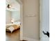 View of bedroom featuring ceiling fan and bright light from window at 2401 Euclid Ave # 207, Charlotte, NC 28203