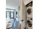 Convenient laundry closet with stacked washer and dryer at 2401 Euclid Ave # 207, Charlotte, NC 28203