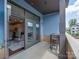 Spacious patio with table, chairs, and view into the home with view to the living room and kitchen at 2401 Euclid Ave # 207, Charlotte, NC 28203