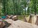 Large deck overlooking the backyard, offering ample space for relaxing and outdoor entertainment at 2437 Woodleigh Dr, Gastonia, NC 28056