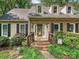 Inviting front entrance with brick steps and a decorative glass door at 2437 Woodleigh Dr, Gastonia, NC 28056