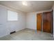 A minimalist bedroom with neutral walls, linoleum flooring, and a window at 2871 Loviee Rd, Lincolnton, NC 28092