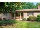 Charming brick home featuring a cozy front porch at 2871 Loviee Rd, Lincolnton, NC 28092