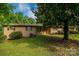 Charming brick home with a well-maintained lawn and mature landscaping at 2871 Loviee Rd, Lincolnton, NC 28092