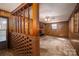 Living room features a unique brick partition with shelving, and brick fireplace at 2871 Loviee Rd, Lincolnton, NC 28092