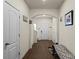 Inviting home foyer featuring hardwood floors and arched entryways at 2922 Patishall Ln, Charlotte, NC 28214