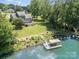 An aerial view of the home, showcasing its serene lakeside location, and private boat dock at 3005 Vernell Ln, Shelby, NC 28150