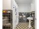 Unique bathroom with black and white checkered floors and a decorative shower curtain at 3005 Vernell Ln, Shelby, NC 28150