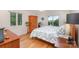 Cozy bedroom features natural light with hardwood floors and views of the river at 3005 Vernell Ln, Shelby, NC 28150