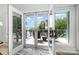 The deck is accessible through French doors, providing a serene view of the lake and lush greenery at 3005 Vernell Ln, Shelby, NC 28150