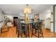 An expansive dining area with hardwood floors, a large table, and an open layout concept at 3005 Vernell Ln, Shelby, NC 28150