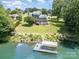 Gorgeous lakefront property with a private dock and a meticulously landscaped backyard at 3005 Vernell Ln, Shelby, NC 28150