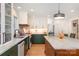 Bright kitchen featuring custom cabinets and updated appliances at 3005 Vernell Ln, Shelby, NC 28150