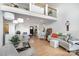 Spacious living room with hardwood floors, large windows, and comfortable seating at 3005 Vernell Ln, Shelby, NC 28150