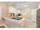 Modern kitchen featuring granite countertops, stainless steel appliances, and ample cabinet space at 3141 Mathis Dr, Charlotte, NC 28208