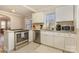 Spacious kitchen with stainless steel appliances, bright cabinets, and modern countertops at 3141 Mathis Dr, Charlotte, NC 28208