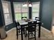 Cozy dining room featuring natural light and modern chandelier at 334 River Birch Cir, Mooresville, NC 28115