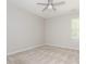 Neutral bedroom with carpet, a window and ceiling fan at 3626 Cole Mill Rd, Charlotte, NC 28270