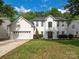 Stately white brick home with well-manicured lawn and mature landscaping at 3626 Cole Mill Rd, Charlotte, NC 28270