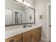 Bathroom featuring a large mirror, modern lighting, and stylish cabinetry at 4016 Spring Cove Way, Belmont, NC 28012