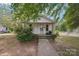 Charming one-story home with vinyl siding, front porch and well-maintained landscaping at 409 Rosemont Ave, Kannapolis, NC 28081
