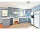 Bright kitchen with modern appliances, ample countertop space, and abundant storage at 409 Rosemont Ave, Kannapolis, NC 28081