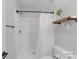 Modern bathroom featuring a shower with a white curtain and a granite countertop at 518 Maynard Farm Ln, Stanley, NC 28164