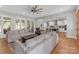 Open layout connecting living room, kitchen, and patio, perfect for entertaining at 518 Maynard Farm Ln, Stanley, NC 28164