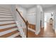 Inviting mudroom featuring built-in bench, storage baskets, and coat hooks at 518 Maynard Farm Ln, Stanley, NC 28164