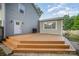 Inviting backyard with a wooden deck and gray siding, perfect for outdoor gatherings at 5421 Princess St, Charlotte, NC 28269