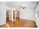 Open-concept layout showcasing hardwood floors and seamless transitions at 5421 Princess St, Charlotte, NC 28269