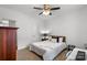 Bright bedroom featuring neutral tones, a ceiling fan, and comfortable furnishings at 5730 Closeburn Rd # H, Charlotte, NC 28210